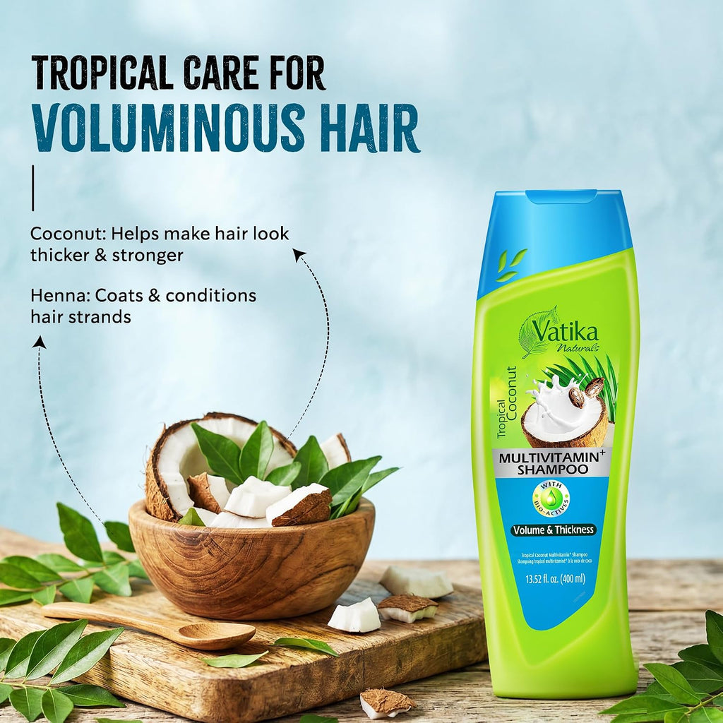 Vatika Multivitamin Shampoo bottle with coconut and henna on a wooden board against a light blue background
