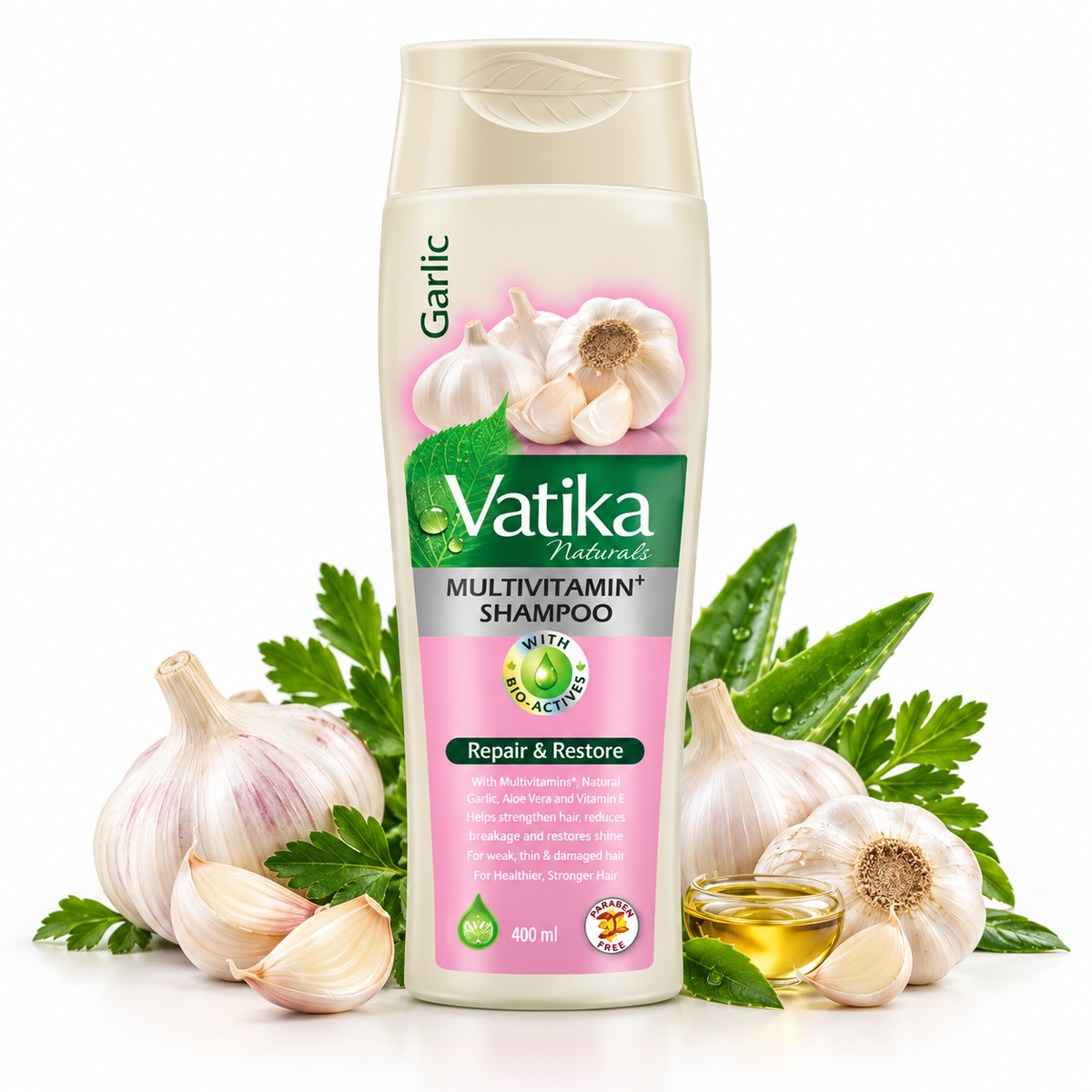 A bottle of Vatika Naturals Multivitamin Shampoo with garlic and parsley props on a white background.
